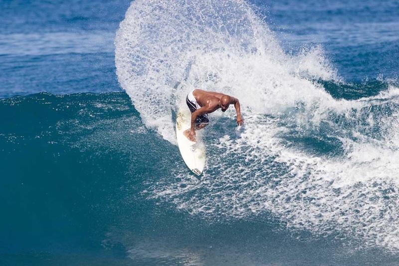 Rainos Hayes carving a powerful turn
